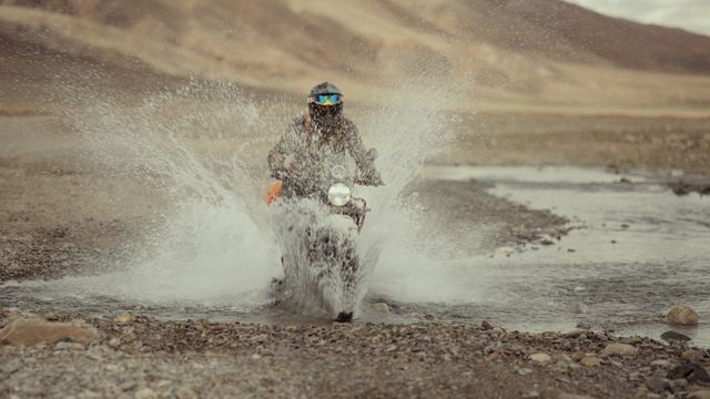 motorcycle riding through water