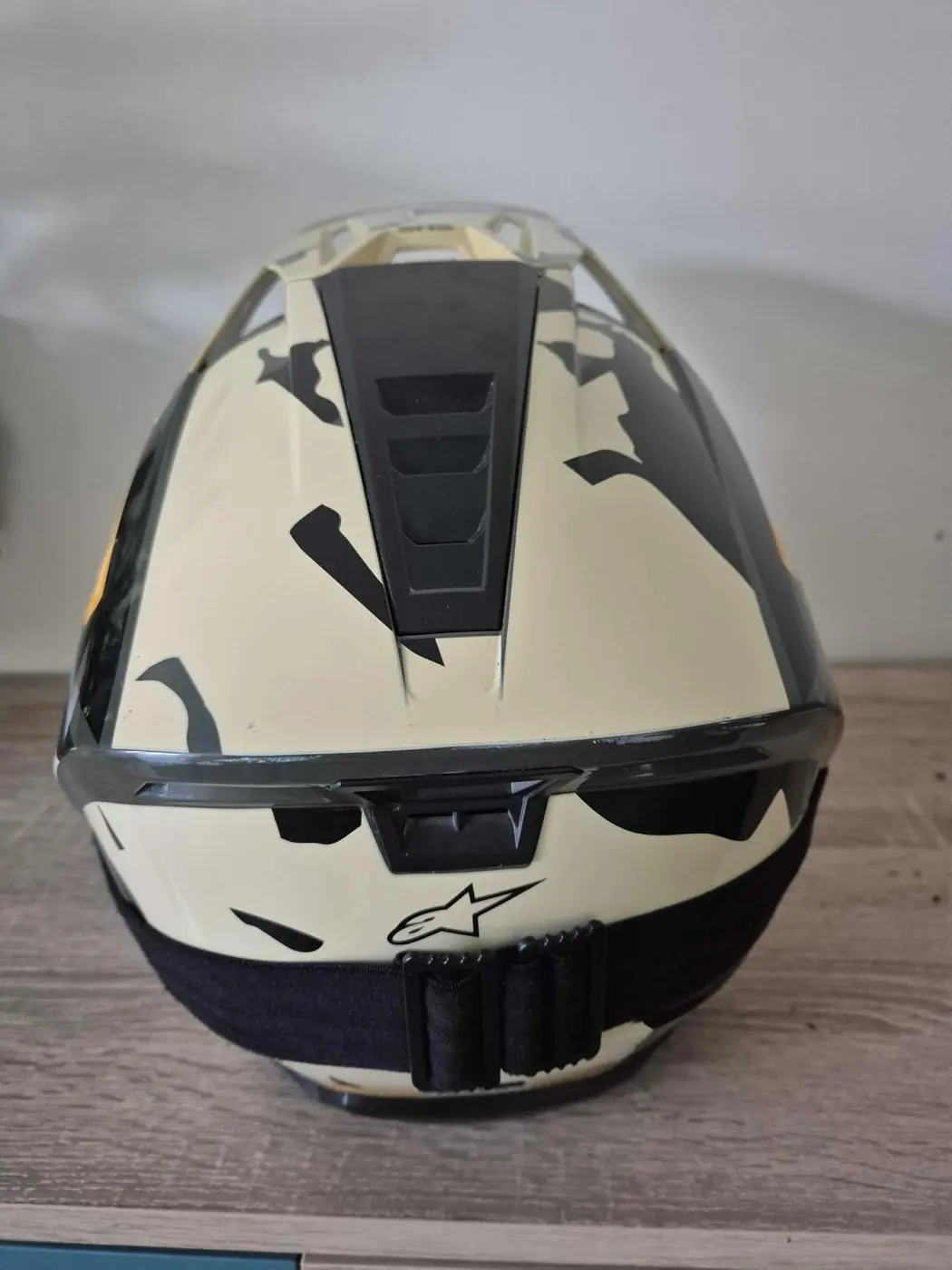 Rear view of the Alpinestars SM5 showing the exhaust vents and goggle strap