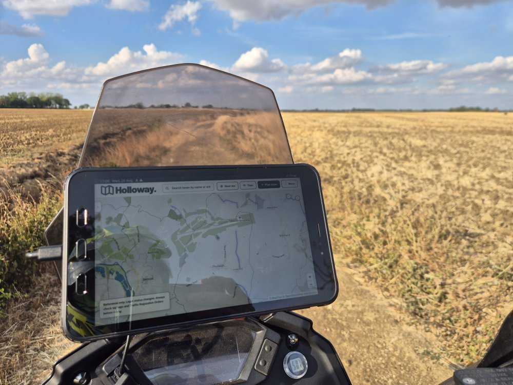 The Holloway map on a tablet on a motorcycle’s handlebars, on Cross End Lane in Bedfordshire