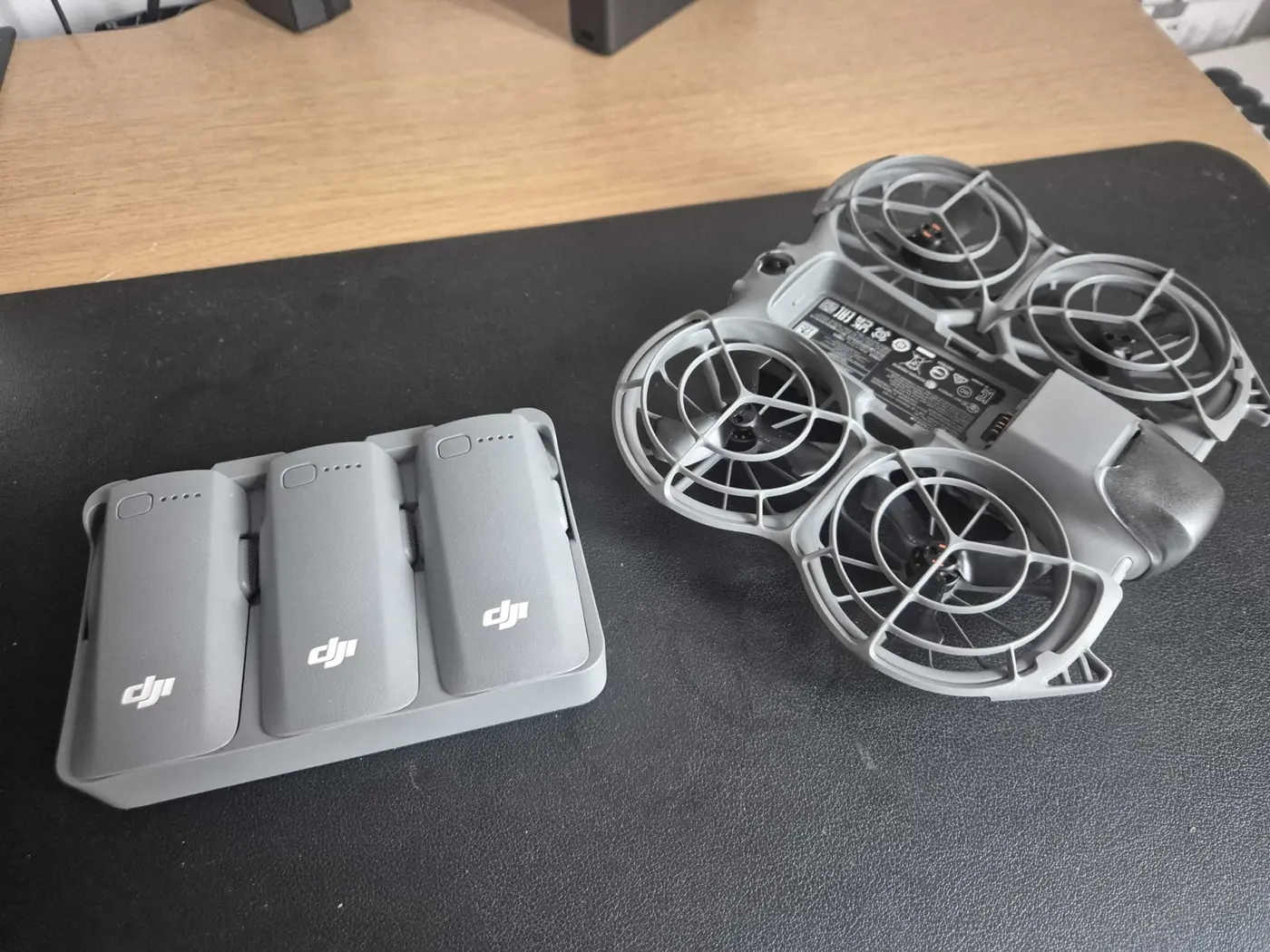 DJI Neo 2 Fly More combo, drone and three-battery charging hub with real DJI batteries