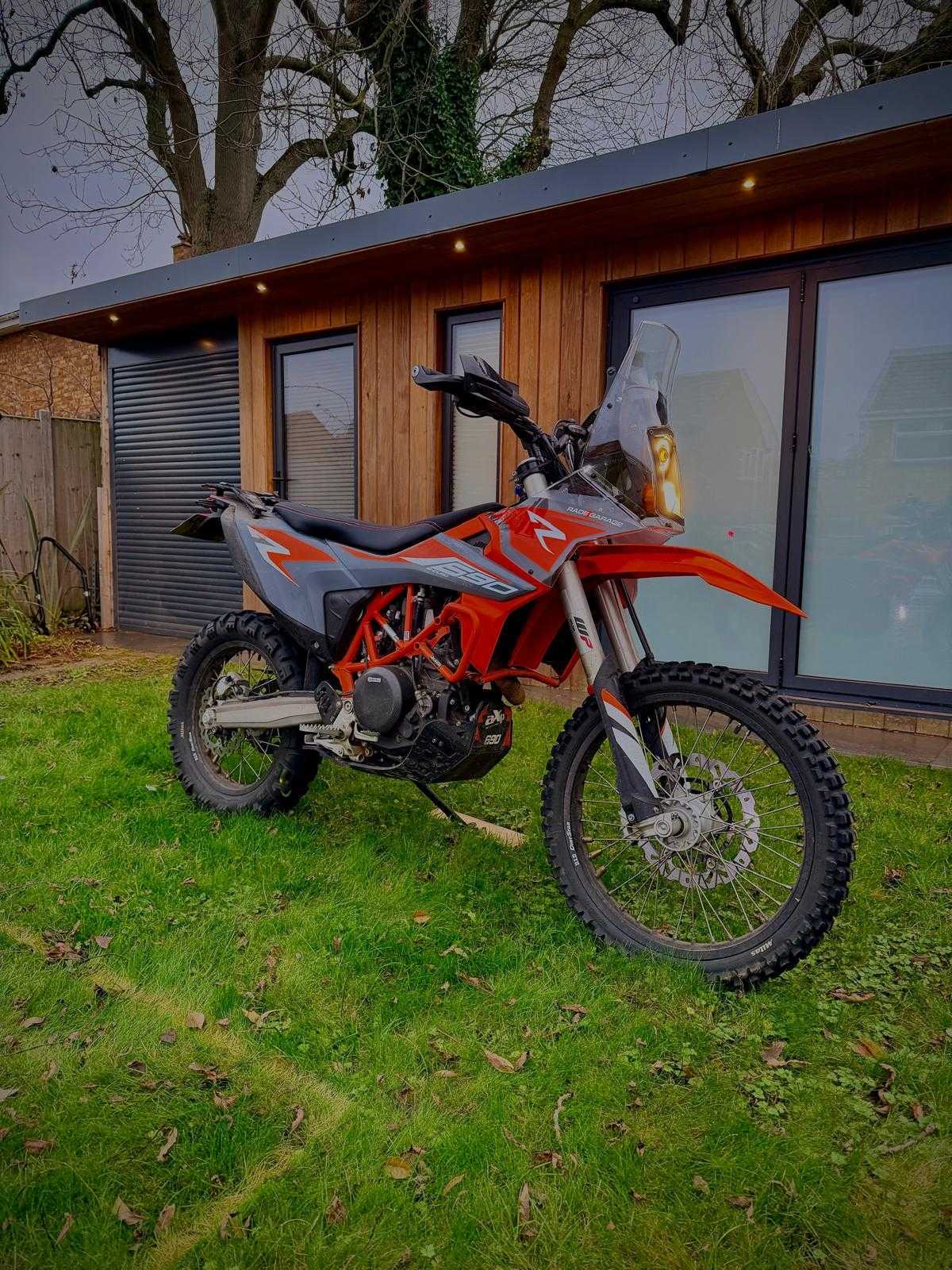 KTM 690 Enduro R with a Rade Garage navigation tower fitted, at dusk