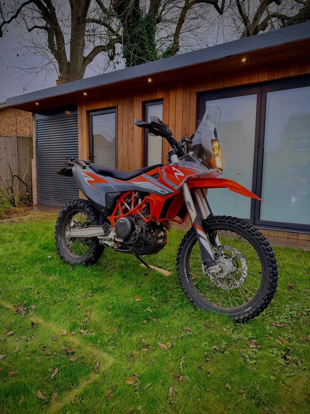 KTM 690 Enduro R with a Rade Garage navigation tower fitted, at dusk