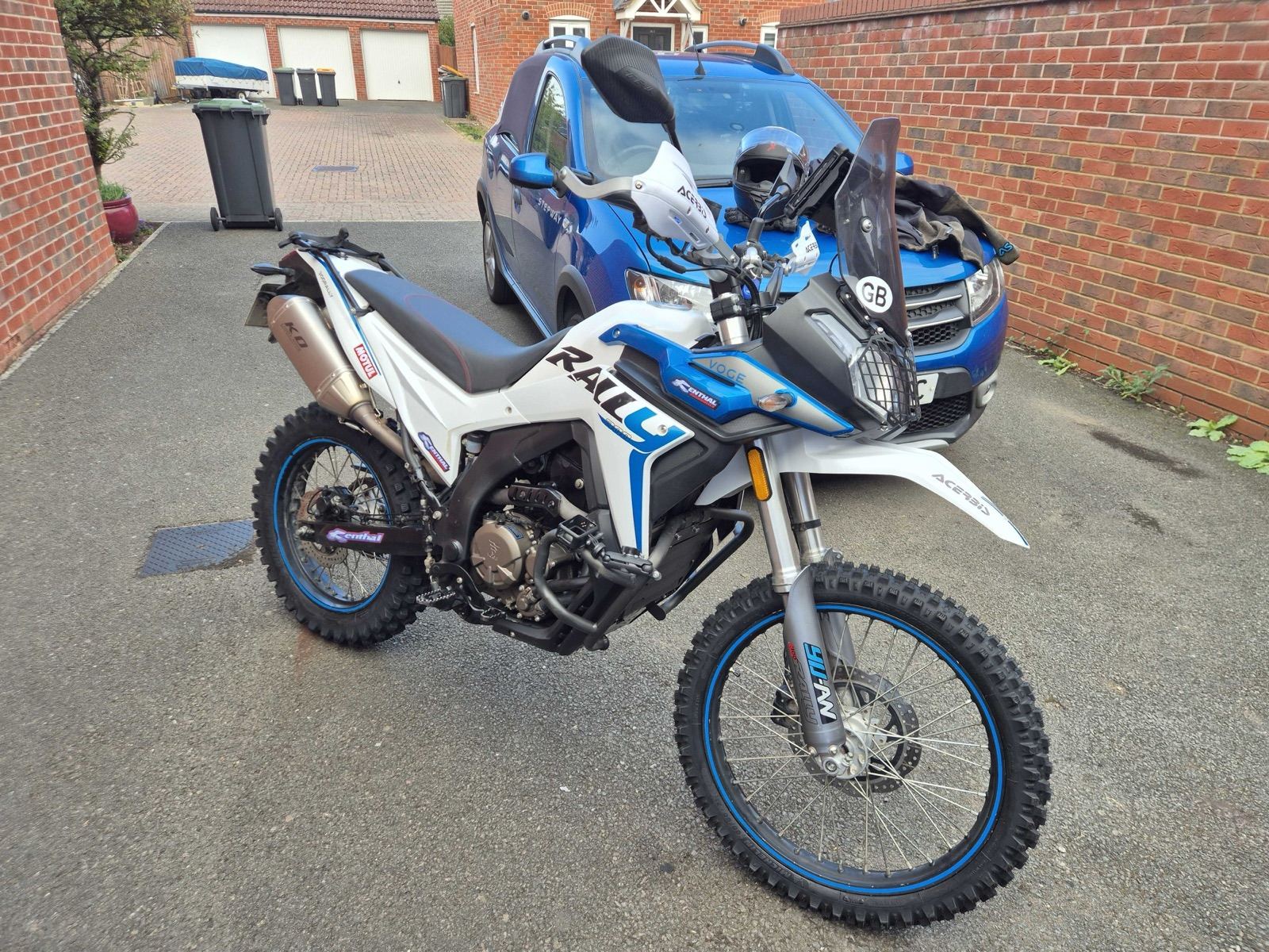 Voge 300 Rally fitted with Michelin Tracker knobbly tyres, parked on a driveway