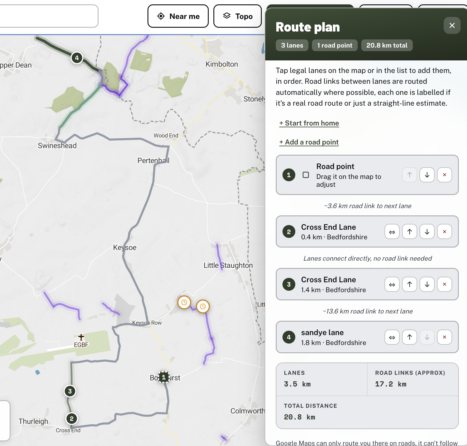 A custom Holloway route linking a road point and two green lanes, with the route panel showing the full stop list, real road-link distances and total distance