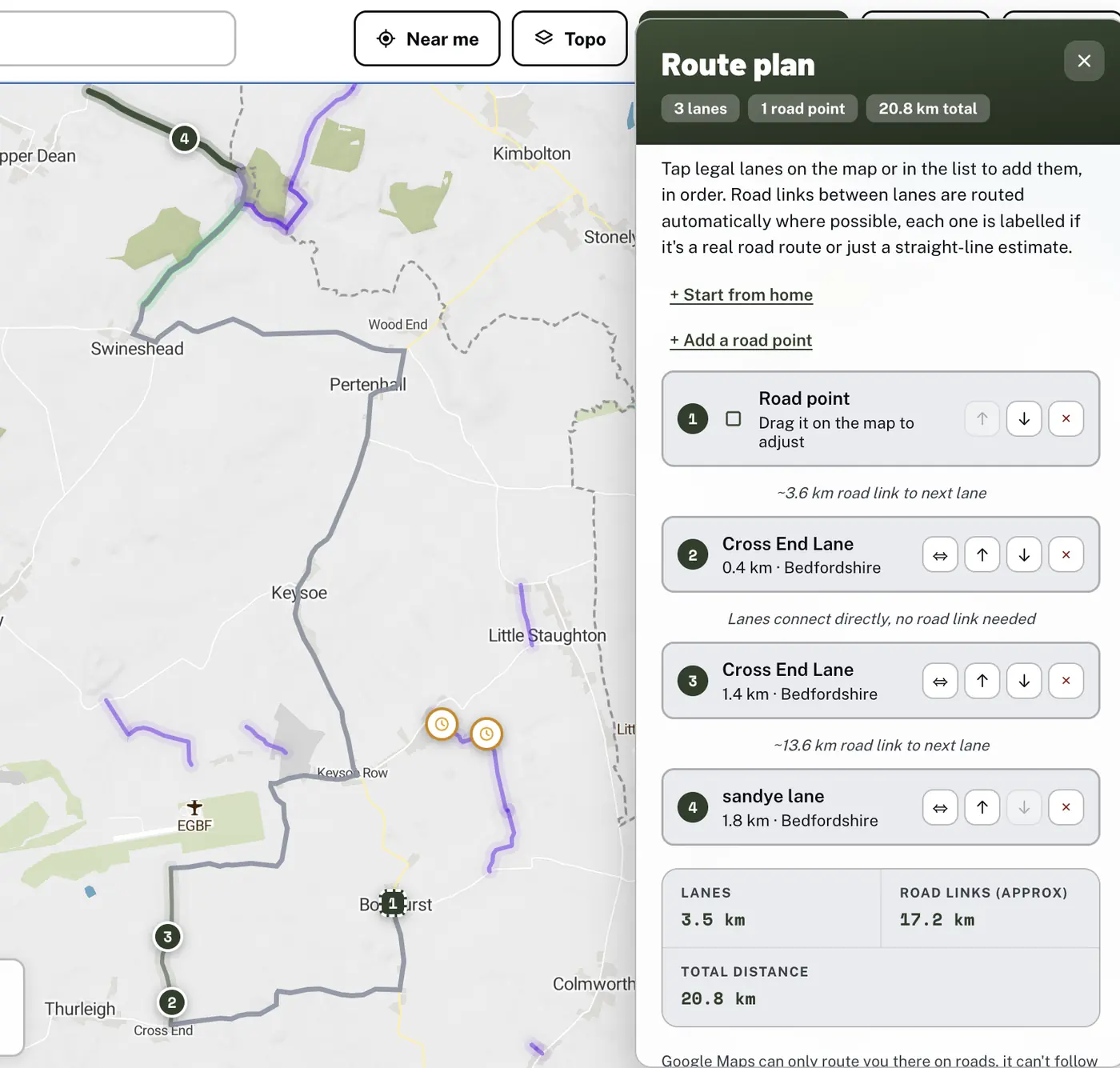 A custom Holloway route linking a road point and two green lanes, with the route panel showing the full stop list, real road-link distances and total distance