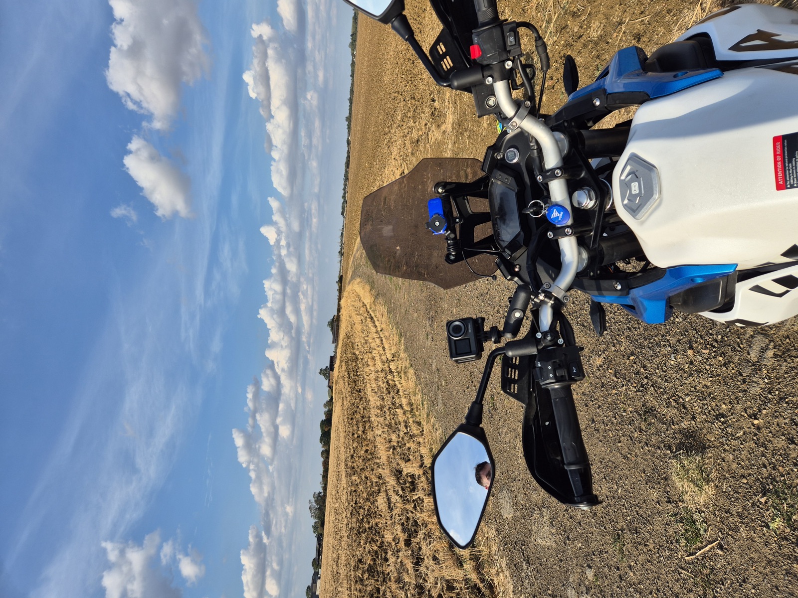 Action camera mounted on the Voge 300 Rally's handlebars for filming a ride