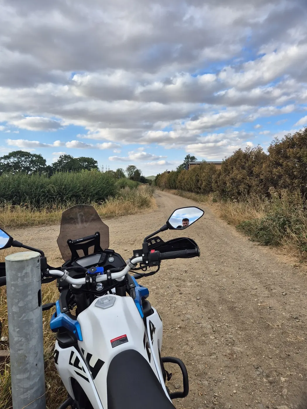 View from the Voge 300 Rally's cockpit looking down a green lane