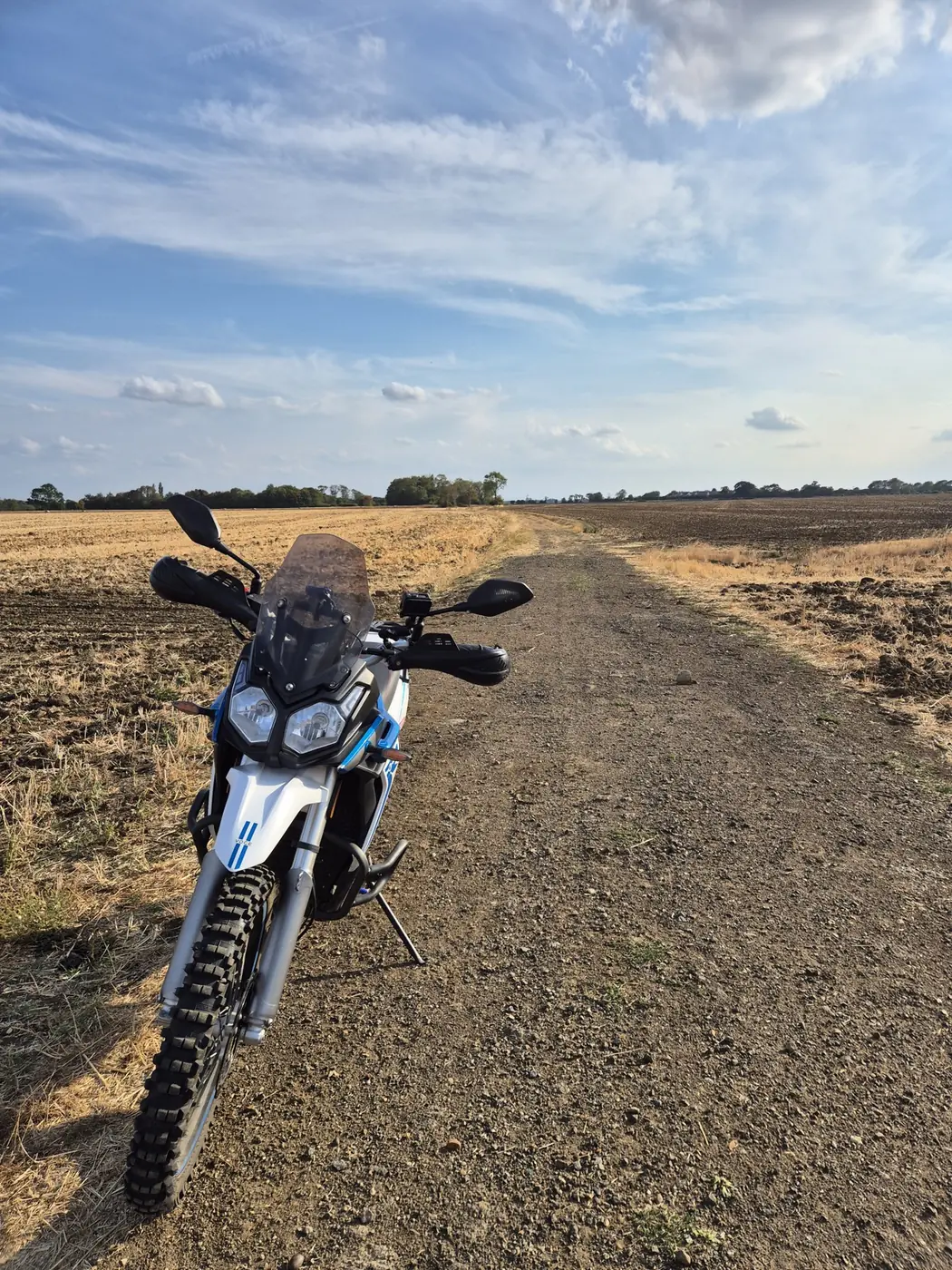 Voge 300 Rally on a farm track, the kind of terrain the Trakmaster is built for